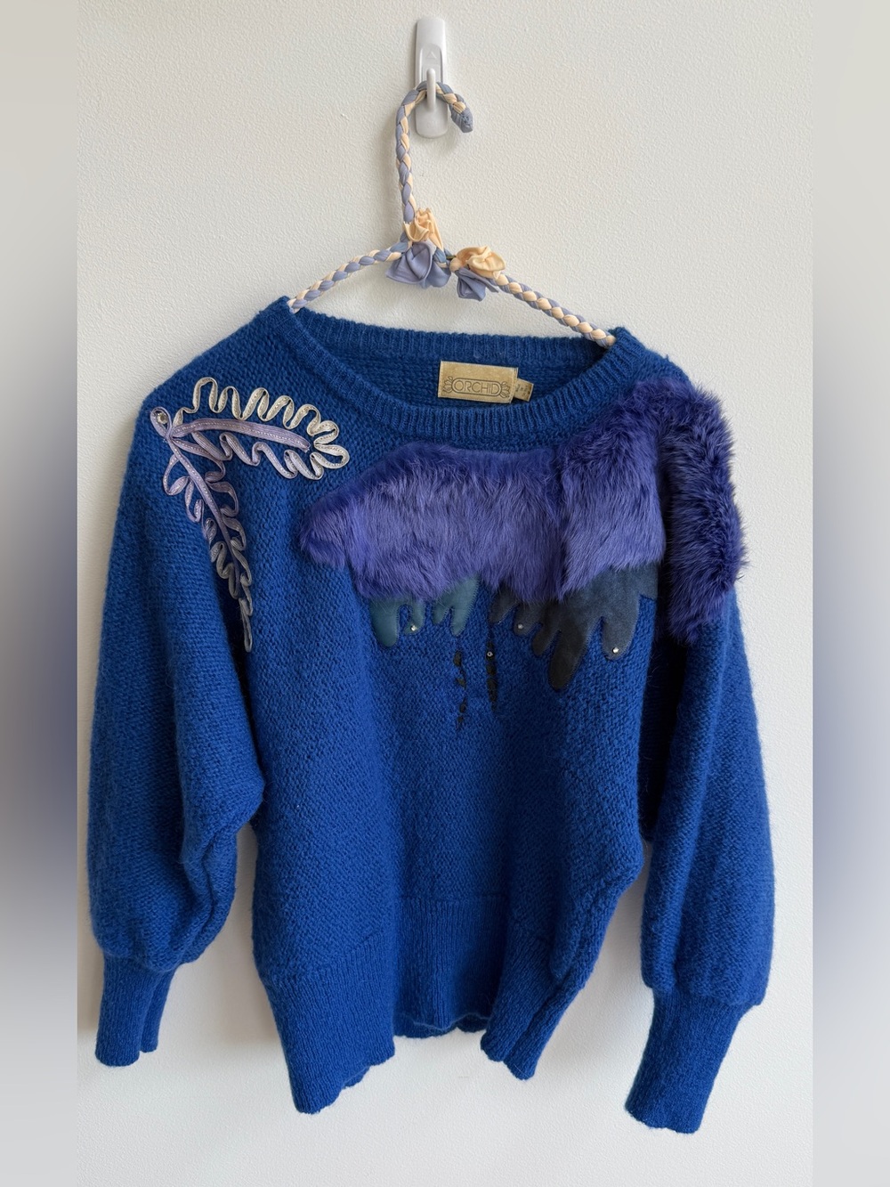 Vintage sweater with leather & bling
Tagged as medium but fits small
Blue 
Made